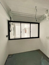 Sliding service yard windows installation for BTO flats